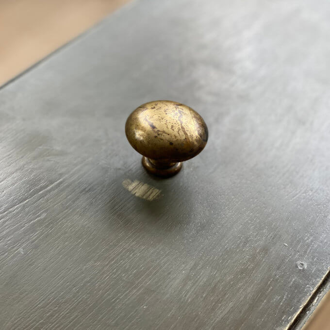 aged brass knob