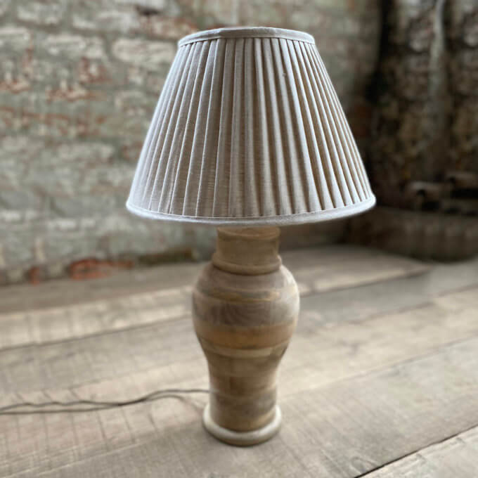 wooden lamp base with lamp shade in natural wood
