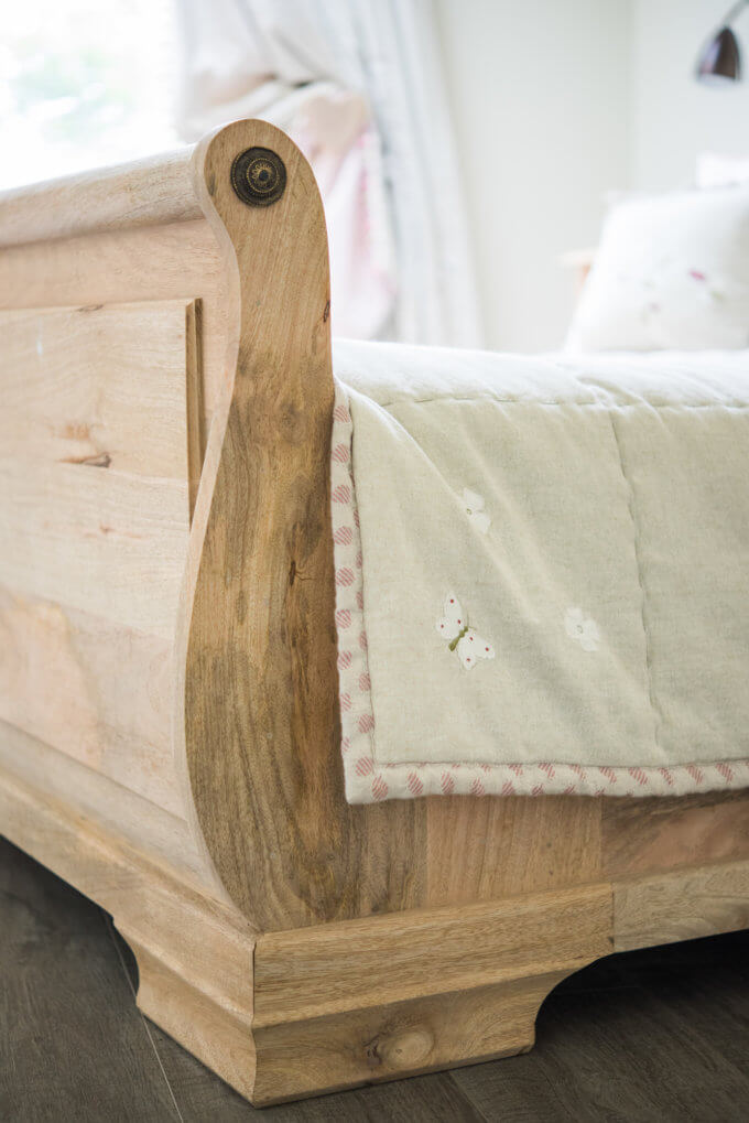Sleigh Bed in natural wood