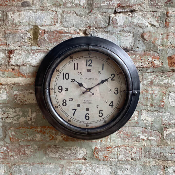 aged metal wall clock